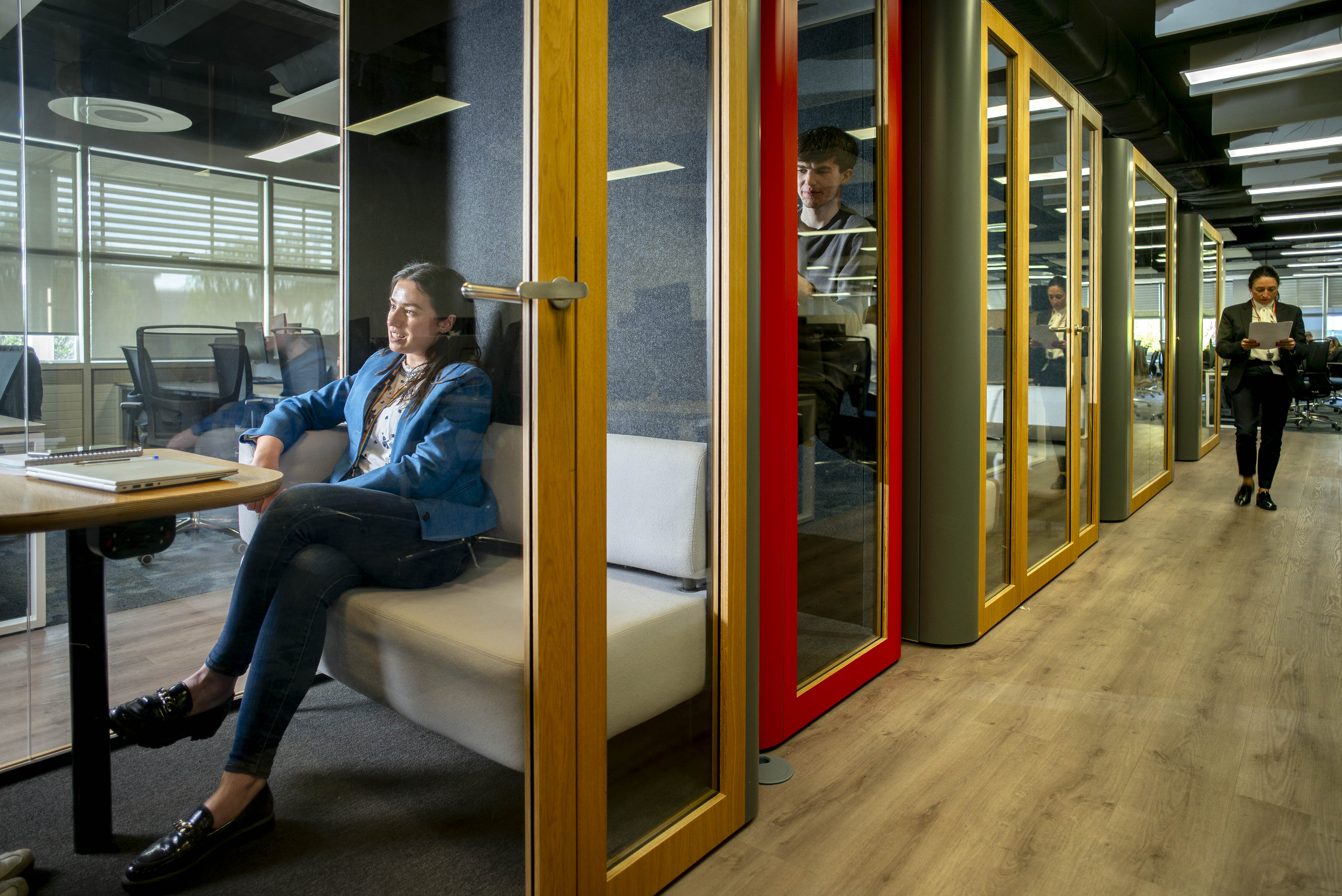 two people looking out the window